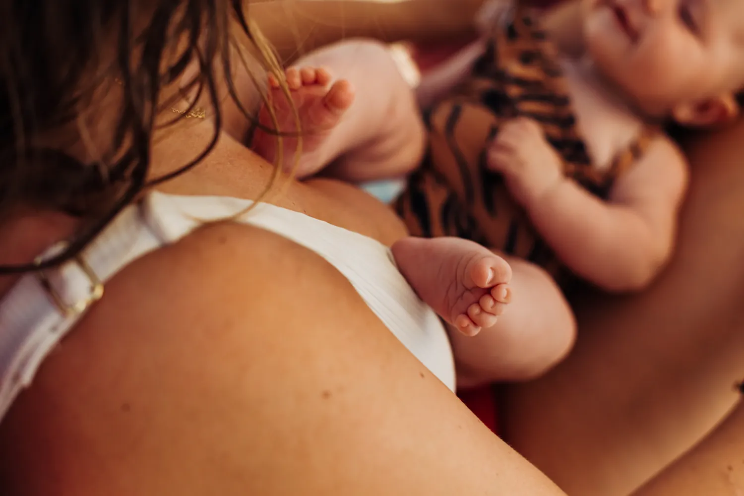 Documentary newborn family photography pool
